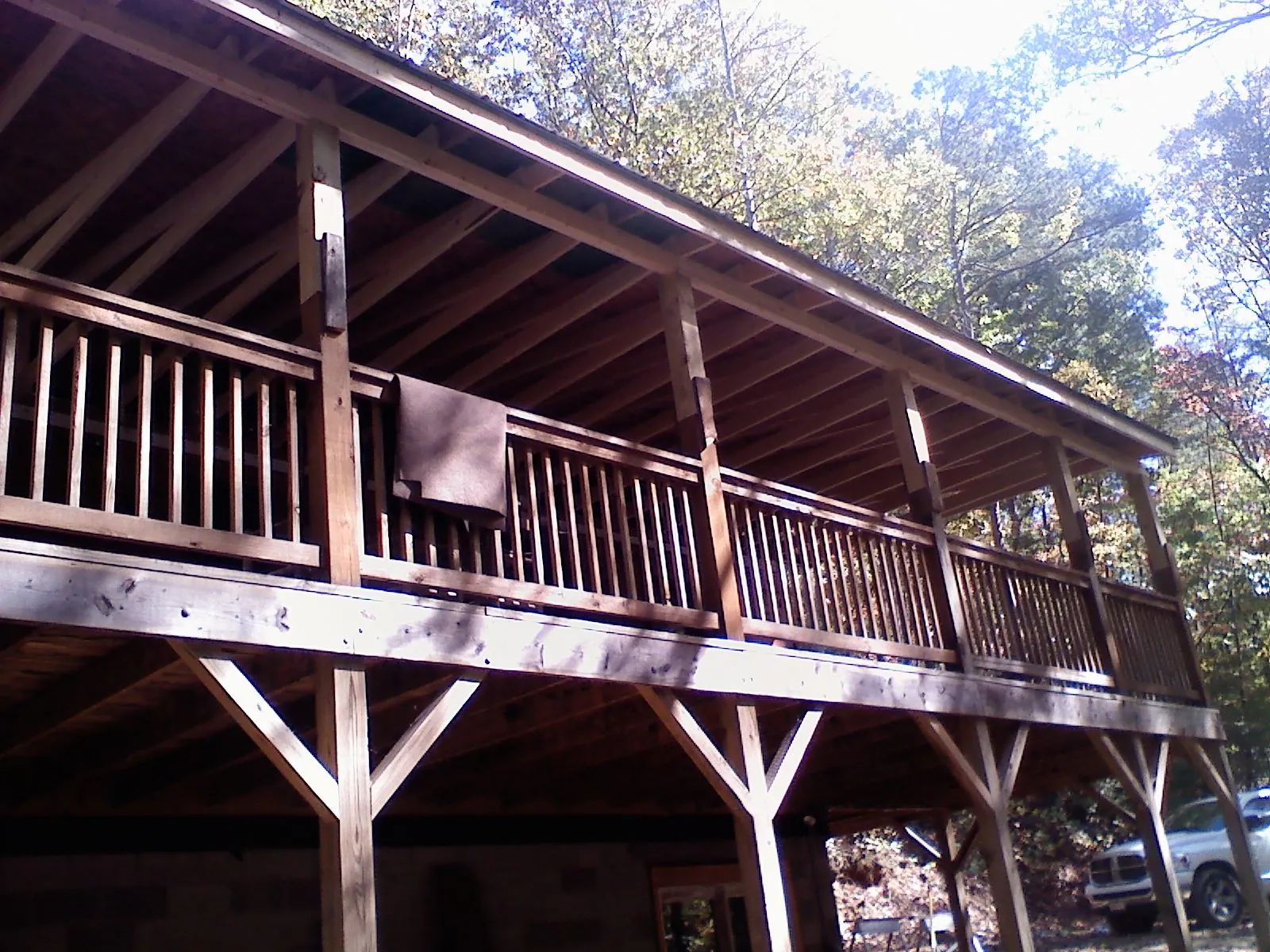 Timber framing under a new elevated porch and deck — Roof Leak Repair in Liberal by Roofing Brothers